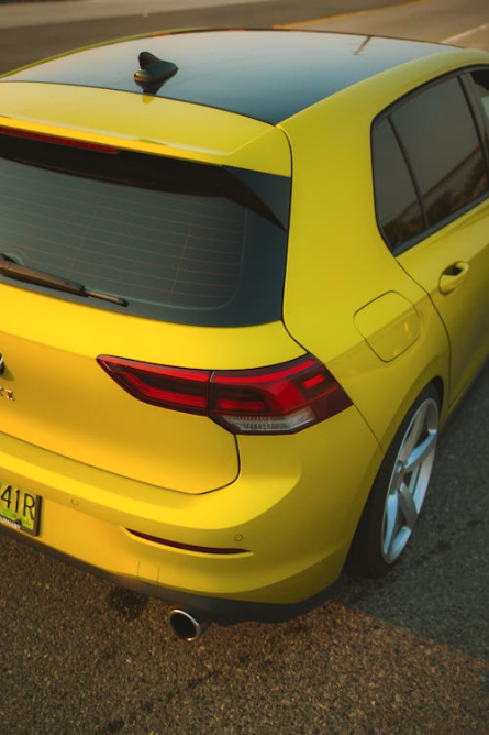 A car with tinted windows in the sun